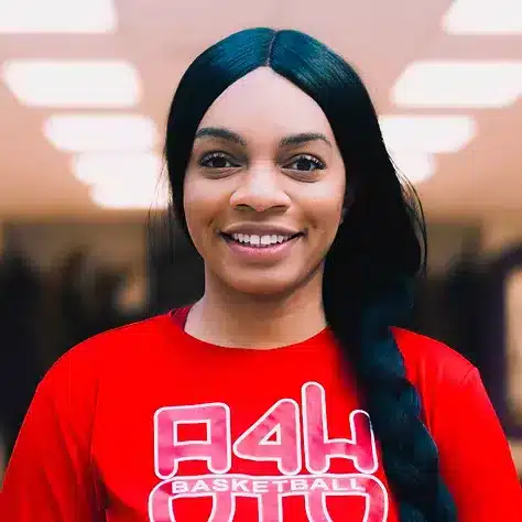 Headshot of a smiling black adult female called Cassandra Brady
