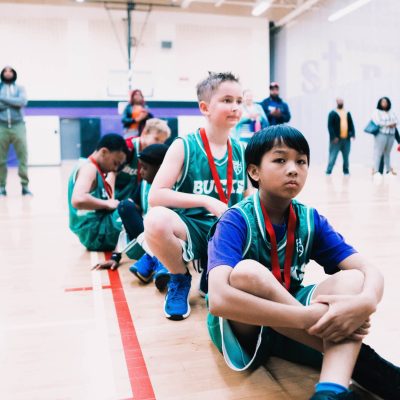 basketball kids with medals round their necks
