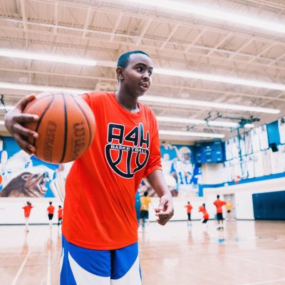 black boy holding basketball