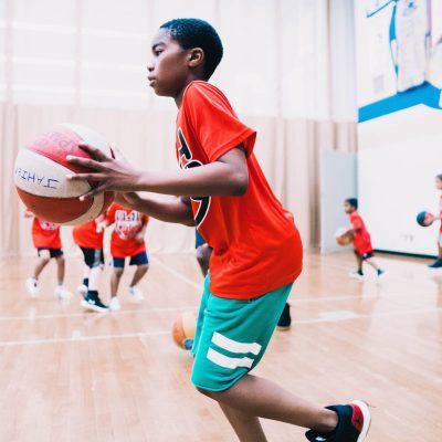 black boy playing basketball